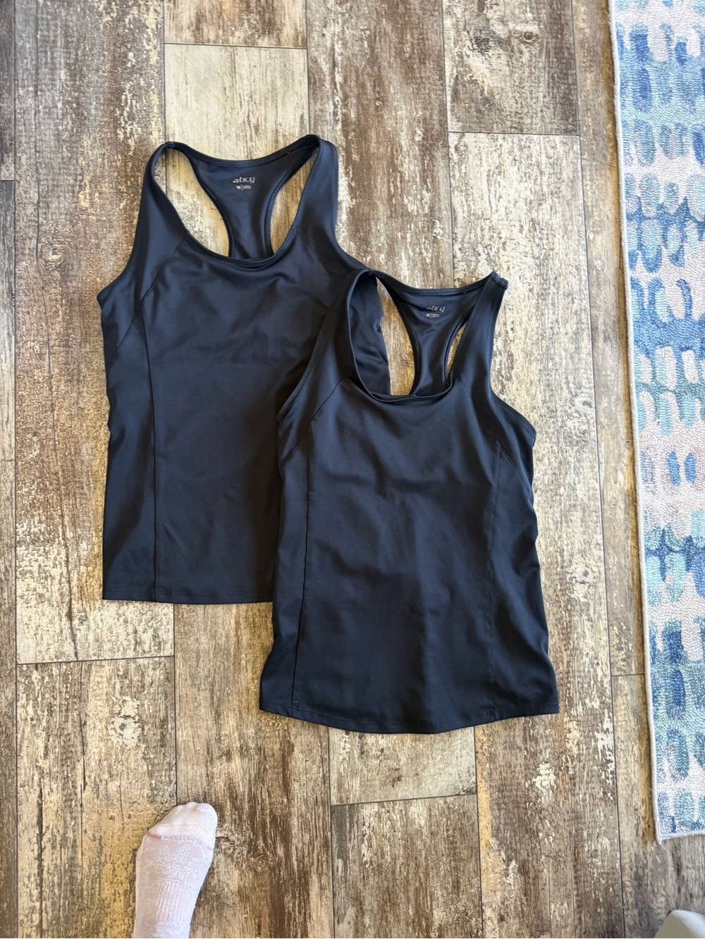 2 listings for $20 sale; 2 BCG black workout tank tops with built in shelf bra.